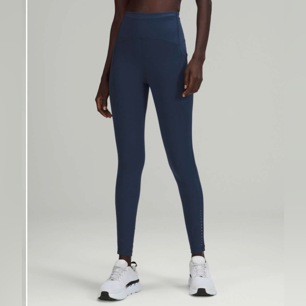 NWT Lululemon Swift Speed High-Rise Tight 28"
Mineral Blue Size 2